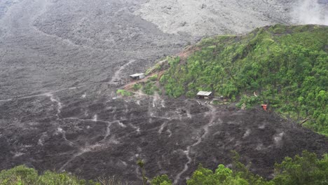Volcanic Landscape with Huts and Trails