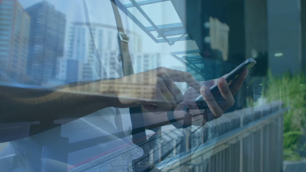 Animation of man using smartphone over cityscape