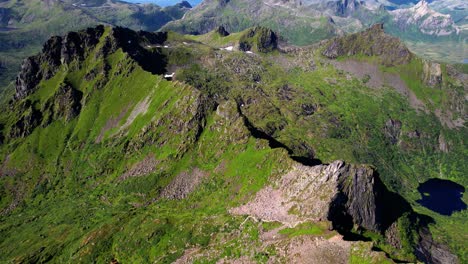 Aerial-shot-of-the-mountain-peaks-surrounding-the-city-of-Svolvaer-in-Lofoten-Norway