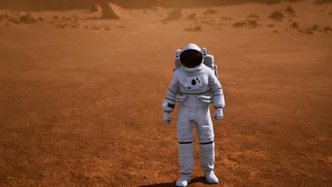 astronauta en la superficie de marte. planeta rojo cubierto de gas y roca