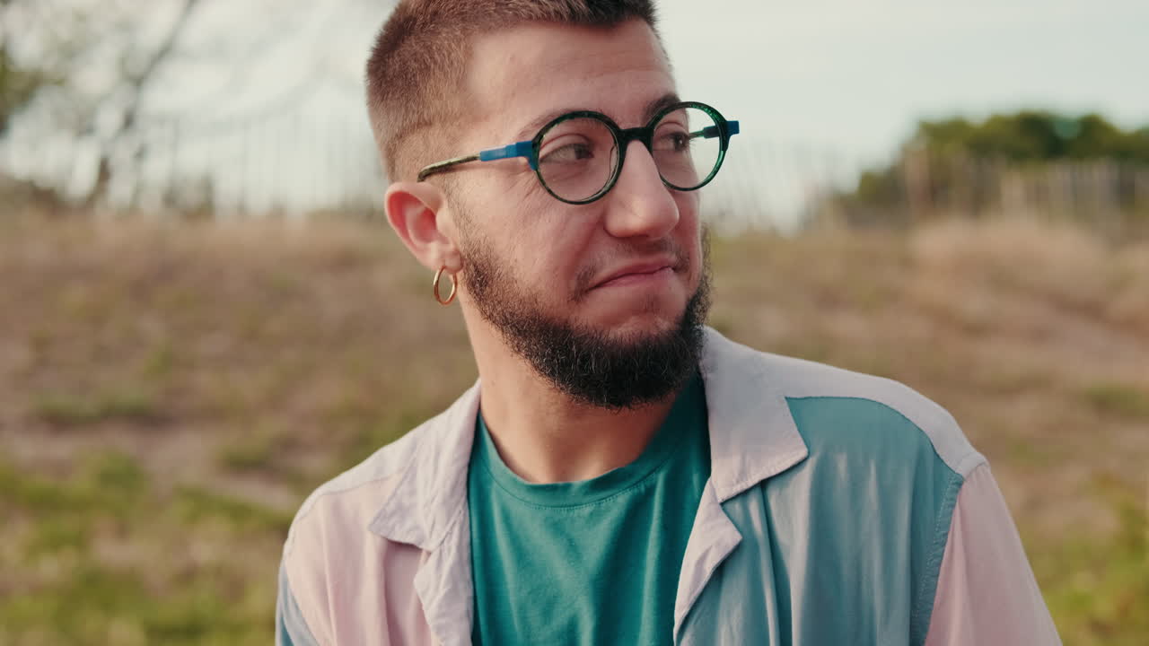 Friends Enjoying a Sunny Picnic Outdoors, focus on the young boy