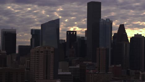 Tracking-left-aerial-shot-of-downtown-Houston-during-sunset