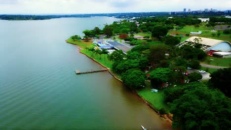 aerial drone shot revealing a shoreline resort in brasilia brazil