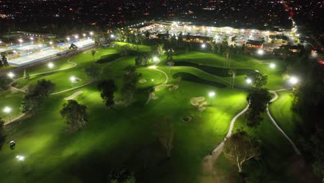 Drone-shot-of-a-Night-Golf-course-with-lights