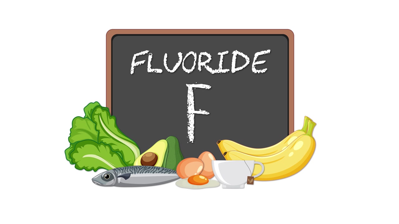 Lavagna animata con simbolo del fluoruro gradualmente circondato da pesce, verdure, uova, banana, bevanda