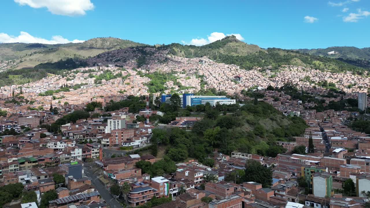 Experience Medellín, Colombia, through an aerial view capturing its vibrant cityscape, surrounded by the majestic Andes Mountains and lush greenery. Perfect for cultural and travel-focused projects.