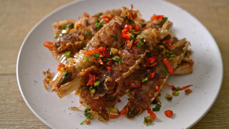 stir-fried mantis shrimp or crayfish with chilli and salt - seafood style