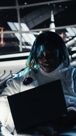 Vertical video Astronaut blinded by light from alien vessel while navigating orbit