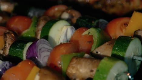 delicious vegetable kebabs gently cooking on bbq