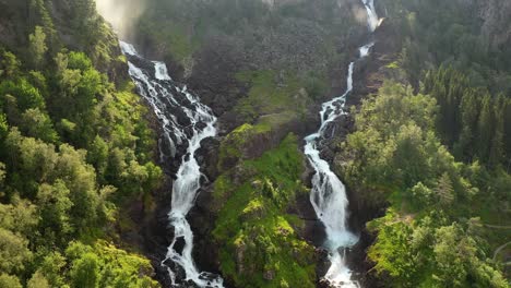 Latefossen-is-one-of-the-most-visited-waterfalls-in-Norway-and-is-located-near-Skare-and-Odda-in-the-region-Hordaland,-Norway.-Consists-of-two-separate-streams-flowing-down-from-the-lake-Lotevatnet.