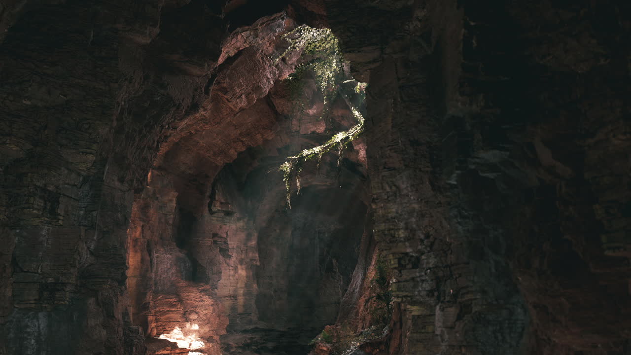 Exploring the stunning underground cave with natural light and rocks