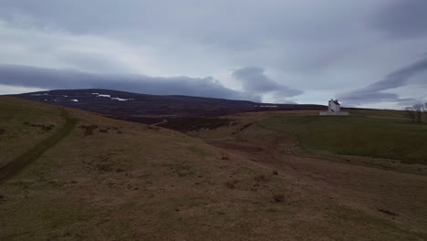 mesmerizing flight over the stunning green and brown landscapes of the scottish highlands