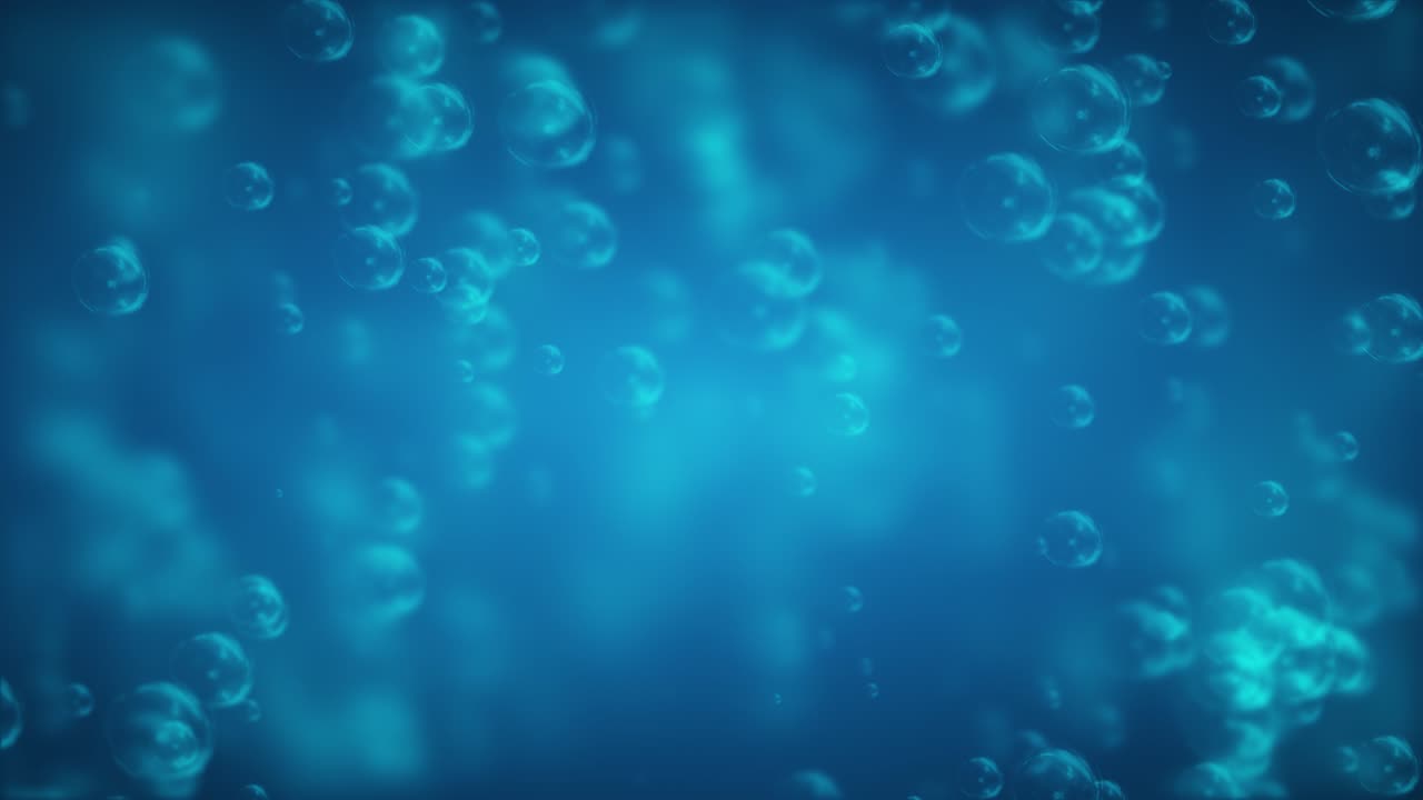 Bubbles floating on blue soft blurred background