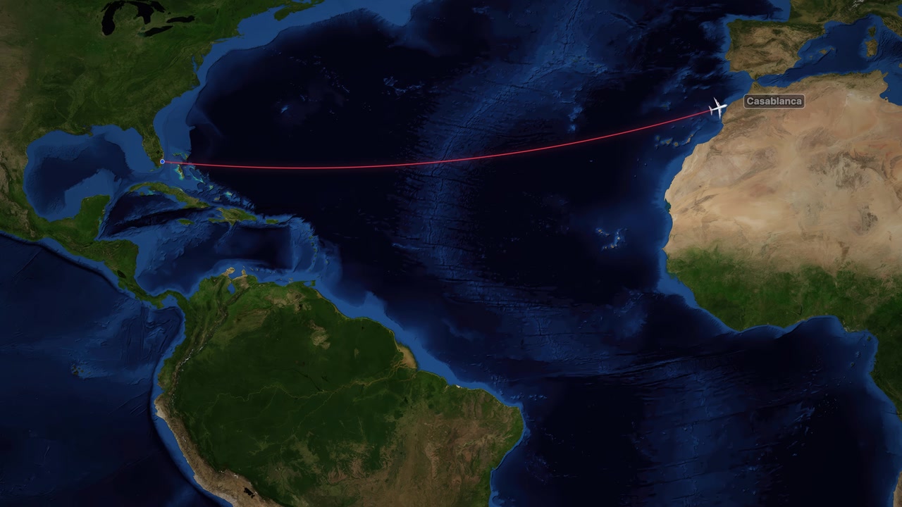 Satellite world map animation tracking a commercial airplane flying from Miami to Casablanca.