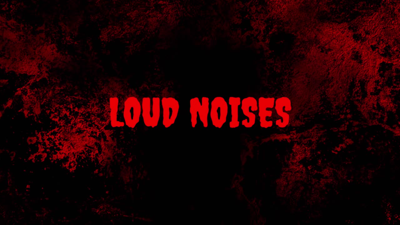 Flashing Loud Noises Text on Dark Grunge Background