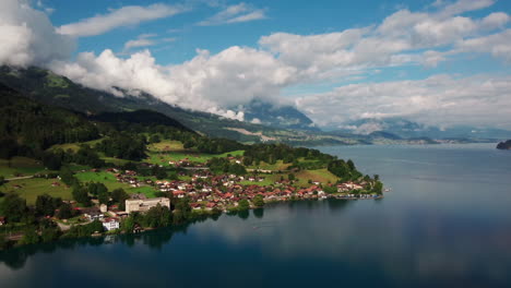 slow circling drone shot showing the mountain town of interlaken