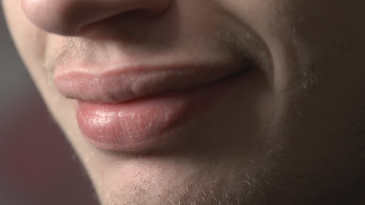 Smiling Young Man With Healthy White Teeth - Extreme Closeup Shot