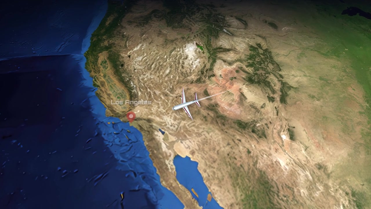 Satellite view animation follows a commercial airplane flying across the United States from east coast
