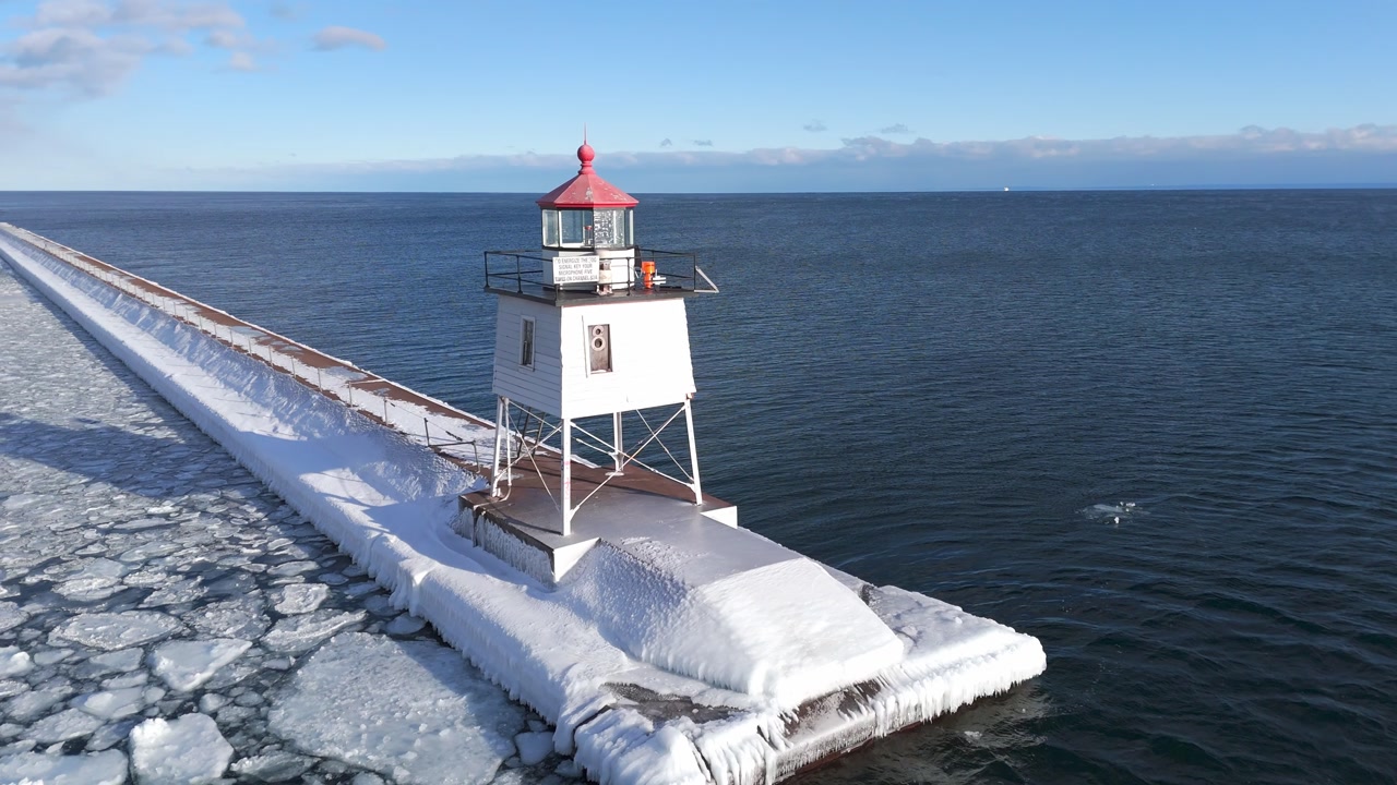 Ice formations on Lake Superior during a winter sunset in Two Harbors Minnesota