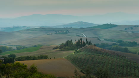 sunset time lapse of tuscany landscape in italy