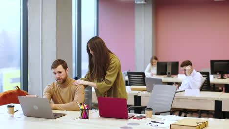 coworkers talking in the office