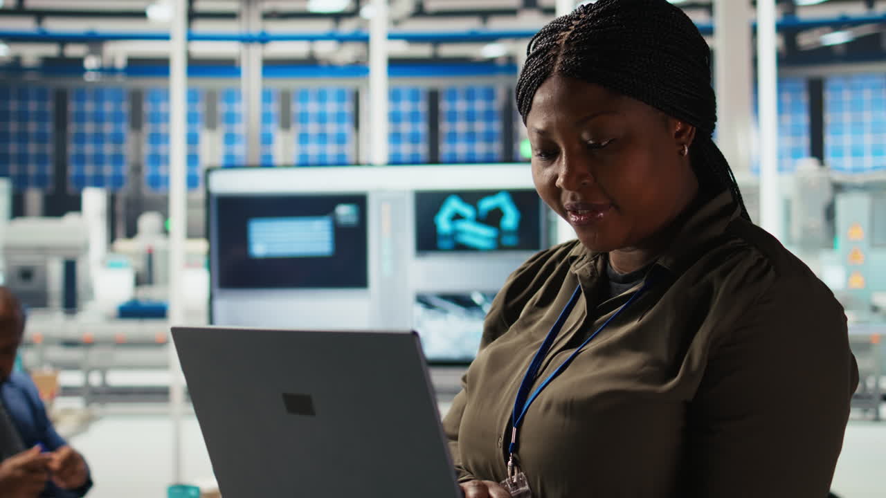 Researcher Analyzes Prototypes Using Laptop To Optimize Energy Production