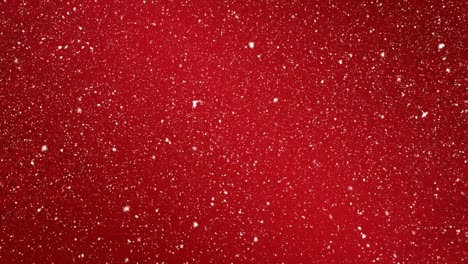 animación digital de nieve cayendo sobre fondo rojo con espacio de copia