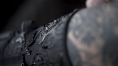 close-up of a black and grey tattoo on an arm