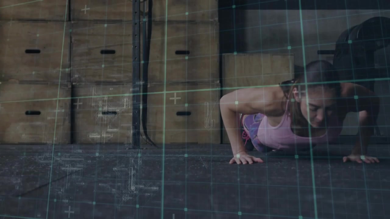 Atleta donna che sposta il peso, iniziando un burpee sul pavimento della palestra; una sovrapposizione a griglia traccia la forma per il fitness.
