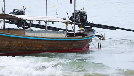 traditional boat navigating through gentle waves