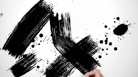 abstract black ink brushstrokes with hand on white background