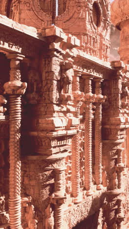 ruins of an ancient temple with stone columns and carvings