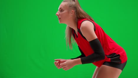 volleyball player receiving the ball