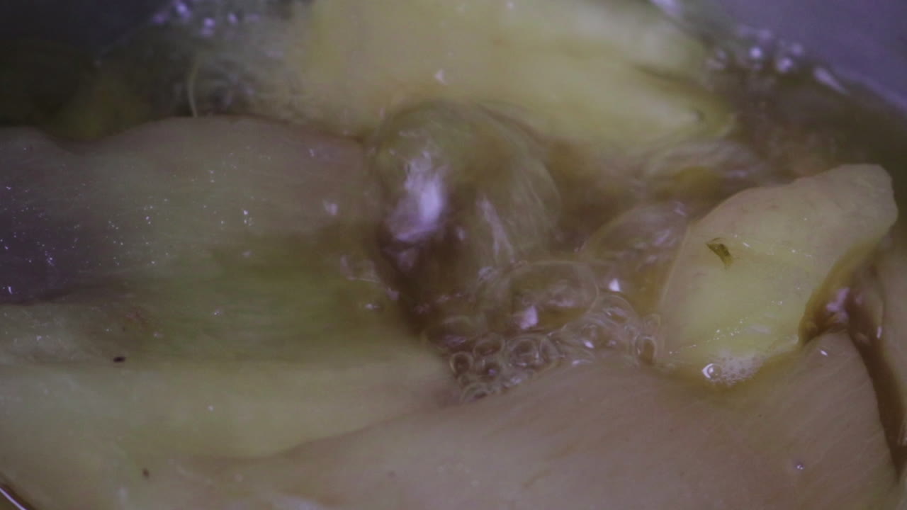 Cooking yucca in boiling water. Static