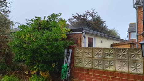 a downpour of rain during extreme weather creating a risk of flooding