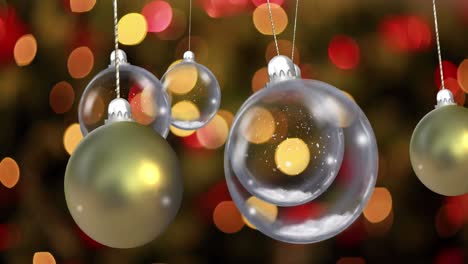 animation of christmas baubles dangling over fairy lights flickering in background