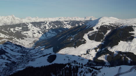 ski area and mountains in saalbach-hinterglemm, austria - aerial drone shot