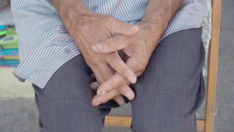 close-up of elderly man's hands