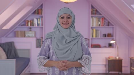 happy muslim woman smiling to the camera