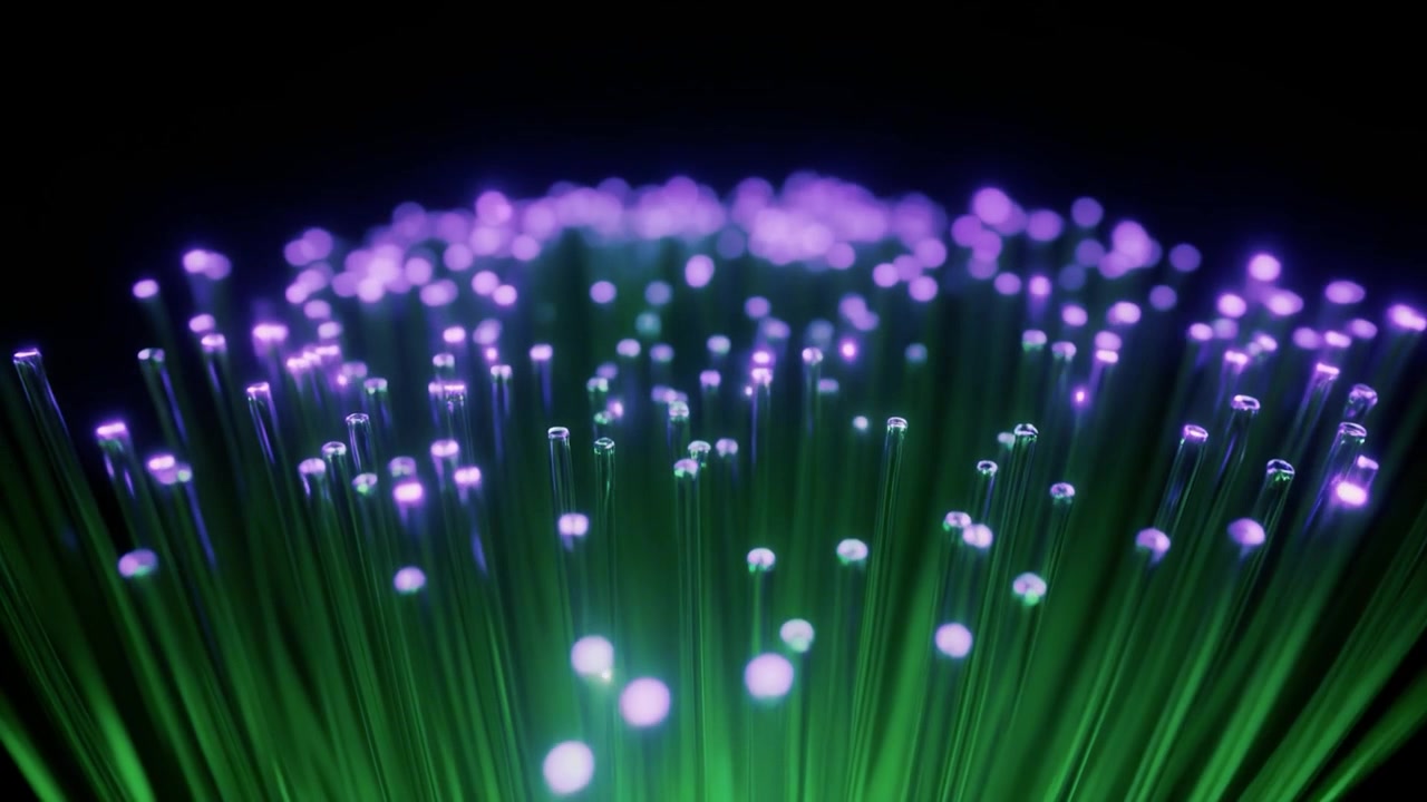 Glowing Fiber Optic Cables Transmitting Data Signals