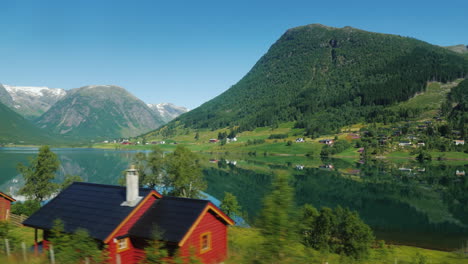 view of the beautiful rural landscape in scandinavia filmed from a car window 4k video