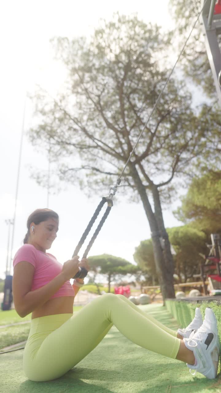 Woman Performing Resistance Training in an Outdoor Gym