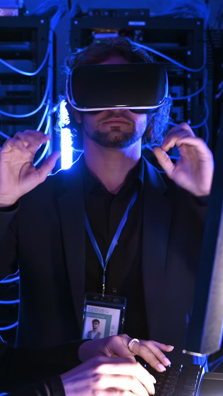 Man using a Virtual Reality headset in a server room. Vertical