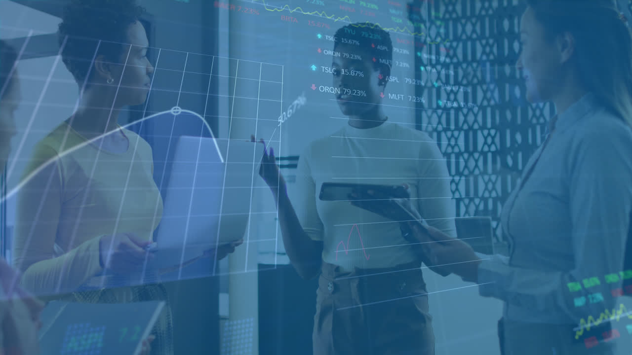 Animation of graphs, trading boards, diverse female coworkers standing and discussing in office