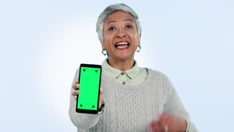 Green-screen,-phone-and-senior-woman-hands-show