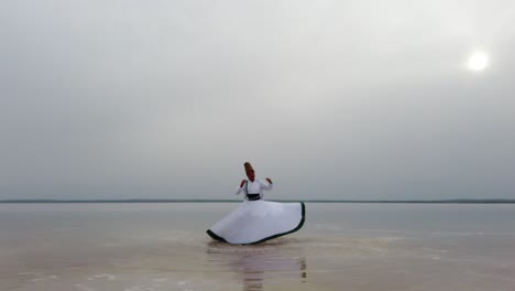 sunset and whirling at the sea, sufi. sufi whirling (turkish: semazen) is a form of sama or physically active meditation which originated among sufis. 4k