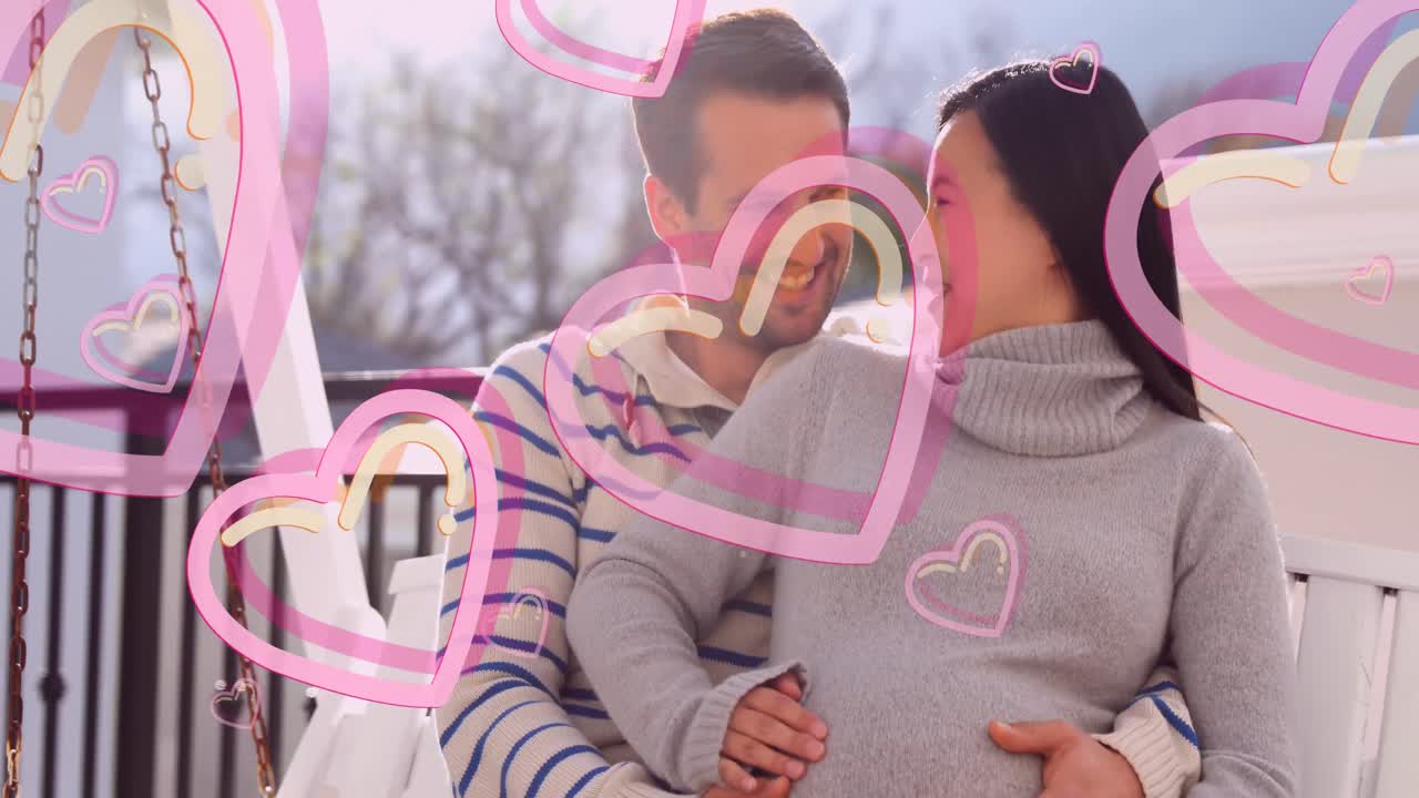 행복한 백인 남자가 임신한 아내를 포옹하는 심장 아이콘의 애니메이션