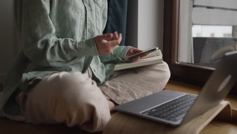 woman working from home by the window