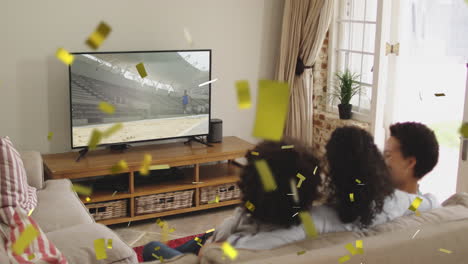 행복 한 아프리카계 미국인 가족 이 tv 를 보고 있는 콘페티 의 애니메이션