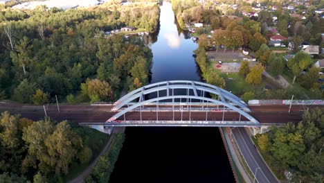 buttery soft aerial view flight speed ramp hyperlapse motionlapse timelapse
railway bridge over river, port in brandenburg germany at summer golden hour 2022